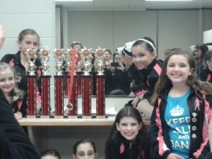 Pam with some of her teammates and a few trophies!